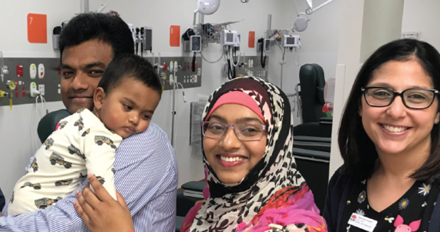 Man, woman, baby and staff member at Bankstown Hospital